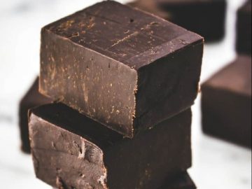 Stacked orange chocolate fudge pieces