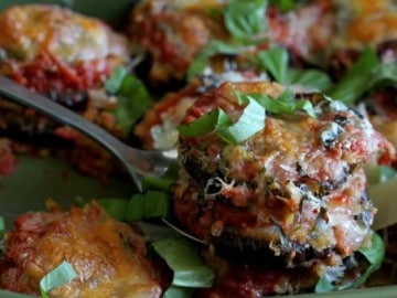 Finished eggplant parmesan casserole on a serving spoon