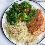 Turkey keto meatloaf on a plate with salad and rice