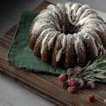 Gingerbread bundt cake with white icing glaze