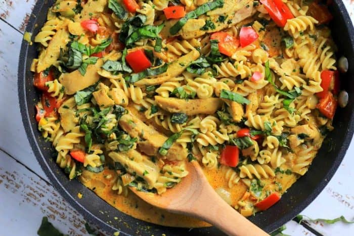 Thai chicken curry pasta with low-carb gluten-free noodles and pan-seared chicken enveloped in a luscious, spice-infused coconut curry cooked in a casserole