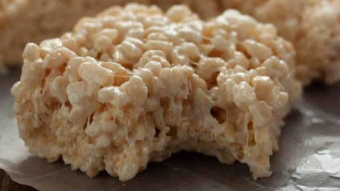 freshly baked coconut Rice Krispies Treats are a fabulous option that gives you delicious coconut flavor in every bite as coconut is infused in three different ways