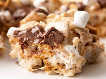 a close up image of S’mores Rice Krispies Treats cuts into smaller pieces