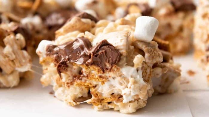 a close up image of S’mores Rice Krispies Treats cuts into smaller pieces