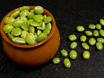 lima beans in the brown pot as food background