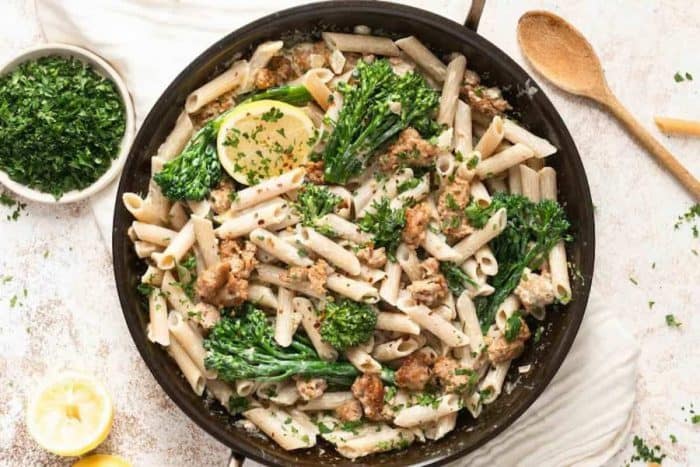al dente gluten-free penne pasta with the robust flavors of juicy, savory sausage and the slightly bitter yet tender crunch of broccolini, each forkful of this dish offers a delightful contrast of different textures