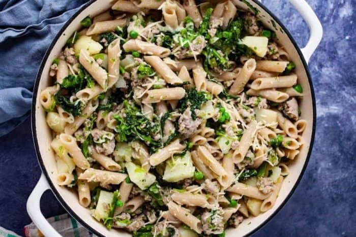 freshly cooked gluten free pasta which slightly bitter greens of broccoli rabe complement the juicy, savory sausage, while the gluten-free penne pasta provides a satisfying base that ties all the flavors together placed in a casserole