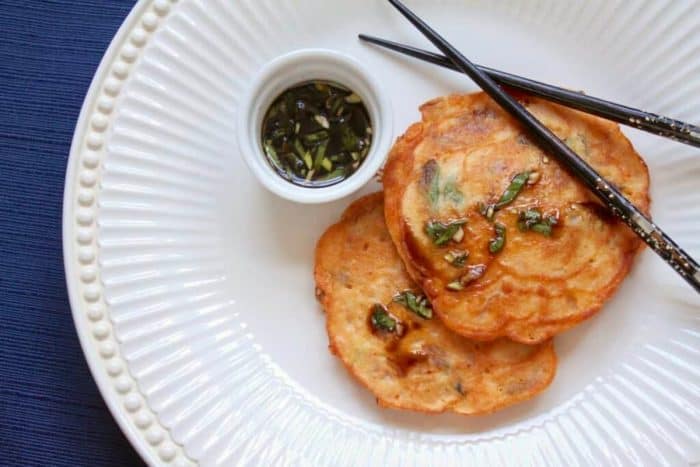 mung bean pancakes made with mung beans, kimchi, green onions, and bean sprouts