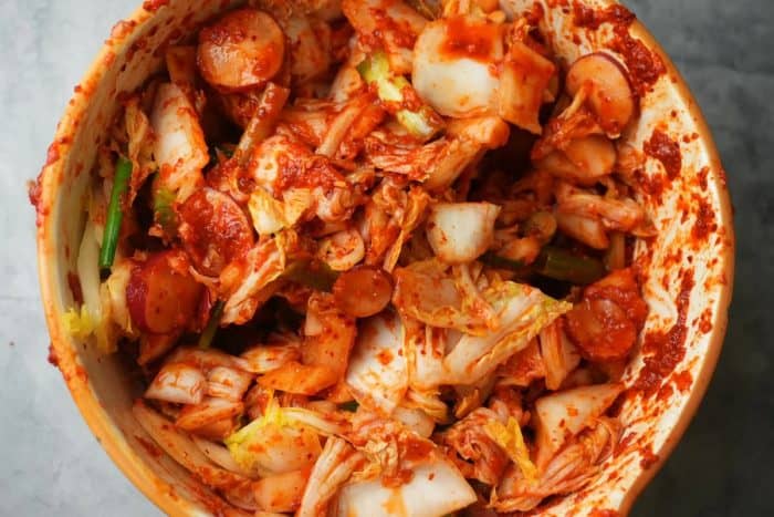 a bowl of freshly made vegan kimchi fermented to perfection
