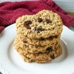Golden-brown oatmeal raisin cookies delight with their crispy surface and chewy center. Sweet raisins punctuate each bite, bursting with a fruity flavor that perfectly complements the hearty oats.