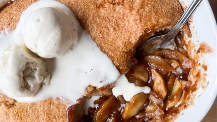 This sourdough apple cobbler recipe features warm, sugary, spiced apples nestled beneath a crisp, tender cobbler topping. It’s the perfect mix of sweet and tart with an irresistible crisp. 