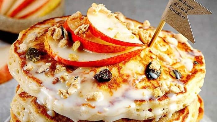 These light and airy sourdough discard pancakes are incredibly fluffy and soft, making them the ultimate fluffy pancake experience topped with maple syrup and fresh fruits