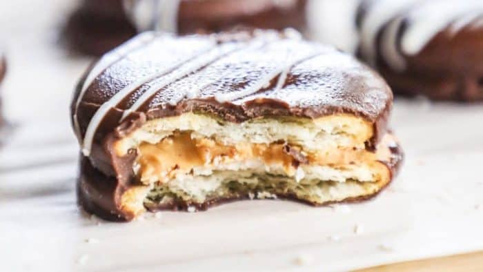 For a playful twist on a classic, try this ingenious creation that uses Ritz crackers as a base, layering them with peanut butter and chocolate for a sweet and salty treat that's as fun to make as it is to eat.