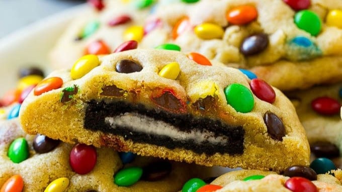 Imagine the surprise tucked inside each of these cookies: a whole Oreo hidden within a soft, buttery shell.