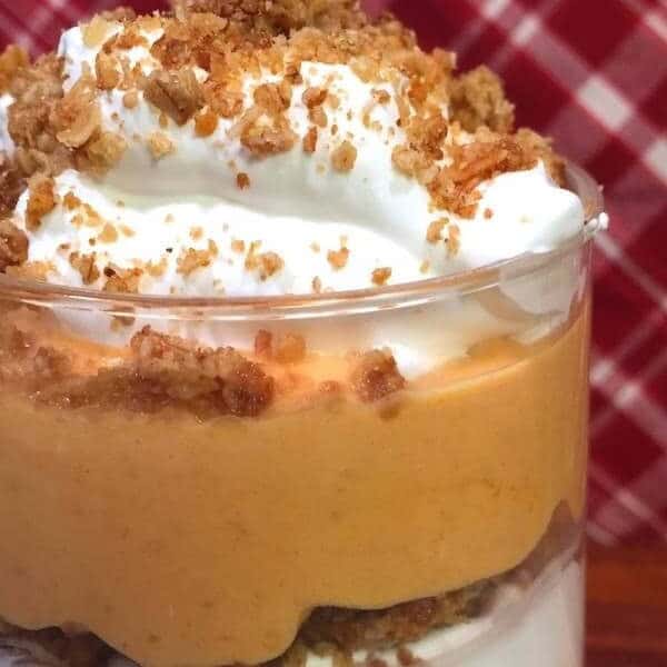 a glass of festive Greek yogurt pumpkin parfait