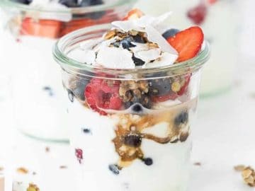 A feast for the eyes and the palate, these parfaits layer velvety Greek yogurt with granola and a medley of berries. 