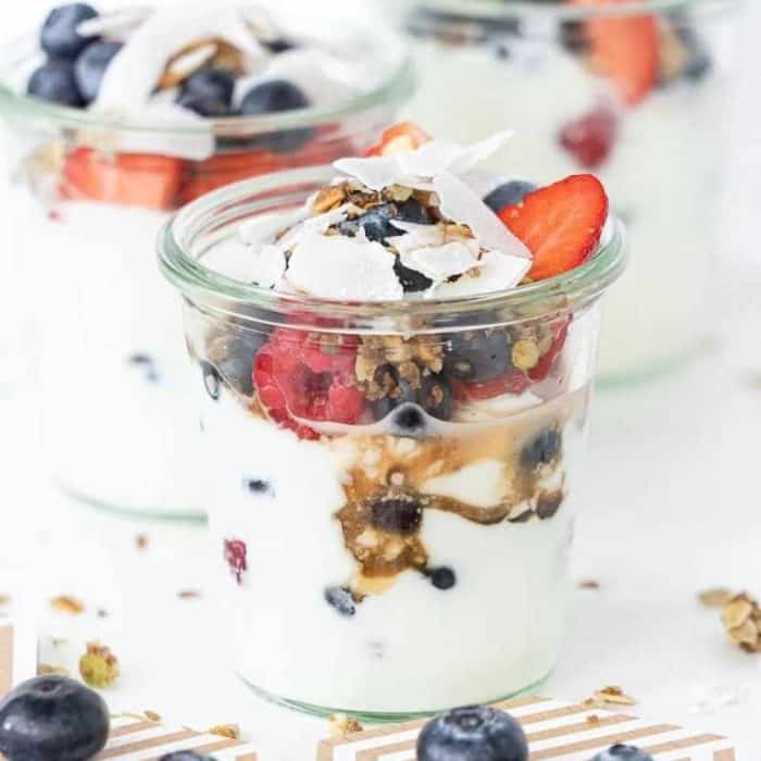 A feast for the eyes and the palate, these parfaits layer velvety Greek yogurt with granola and a medley of berries.