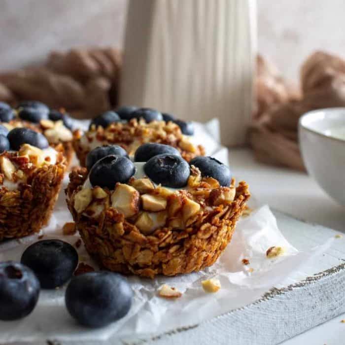 these granola cups, which feature a crunchy granola base filled with creamy Greek yogurt and topped with fresh fruits