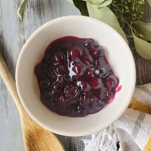 An oldie but a goodie, you can never go wrong with a classic blueberry topping for your cheesecake — like this blueberry sauce!
