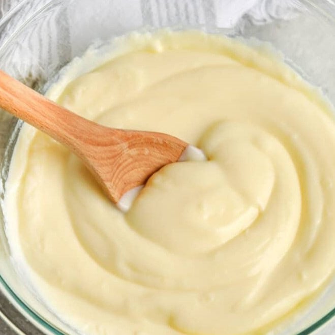 This vanilla custard has a delicate silkiness and a subtle vanilla taste that lets your rich, smooth, sweet, and dense cheesecake take the spotlight instead of overshadowing it.