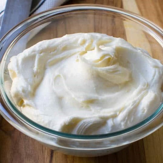 The quintessential partner for a plain cheesecake, this classic cream cheese frosting enhances your dessert’s velvety base with its luscious, creamy flavor profile!