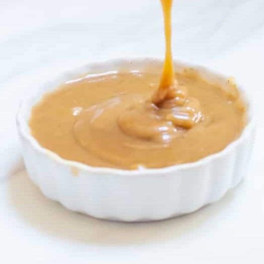 This three-ingredient date caramel sauce is a must-try for those craving a sweet touch to their cheesecake but trying to avoid refined sugar.