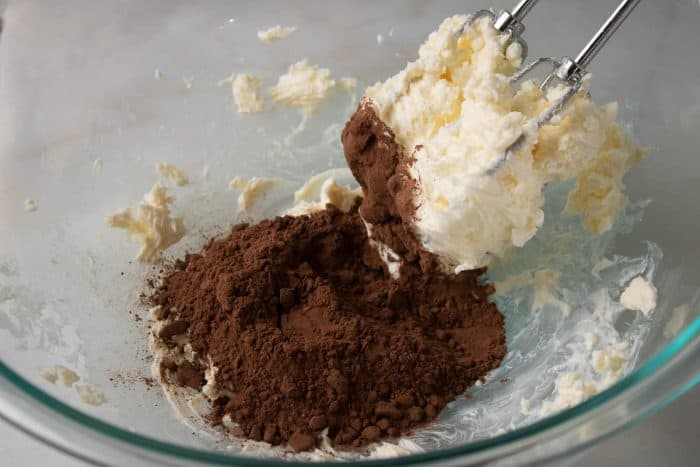 Mix the unsalted butter and cocoa powder in a large bowl until fully combined, making sure the mixture is even.