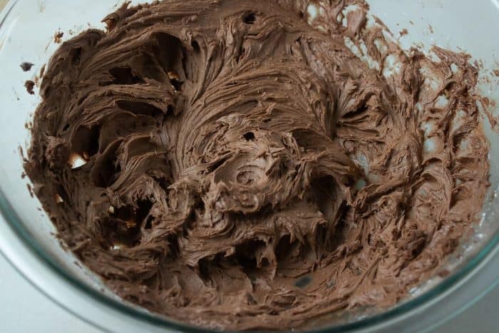 fine-tune the texture and flavor of your frosting by stirring in one to two tablespoons of whole milk and a teaspoon of real vanilla extract.
