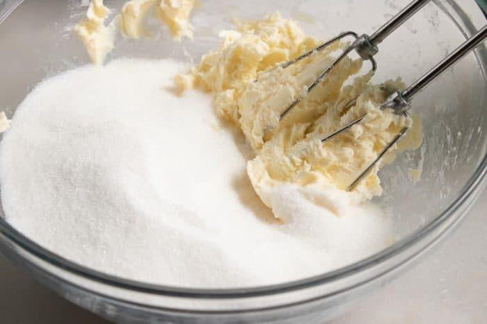 In a mixing bowl, cream the butter and sugar together until you achieve a fluffy mixture.