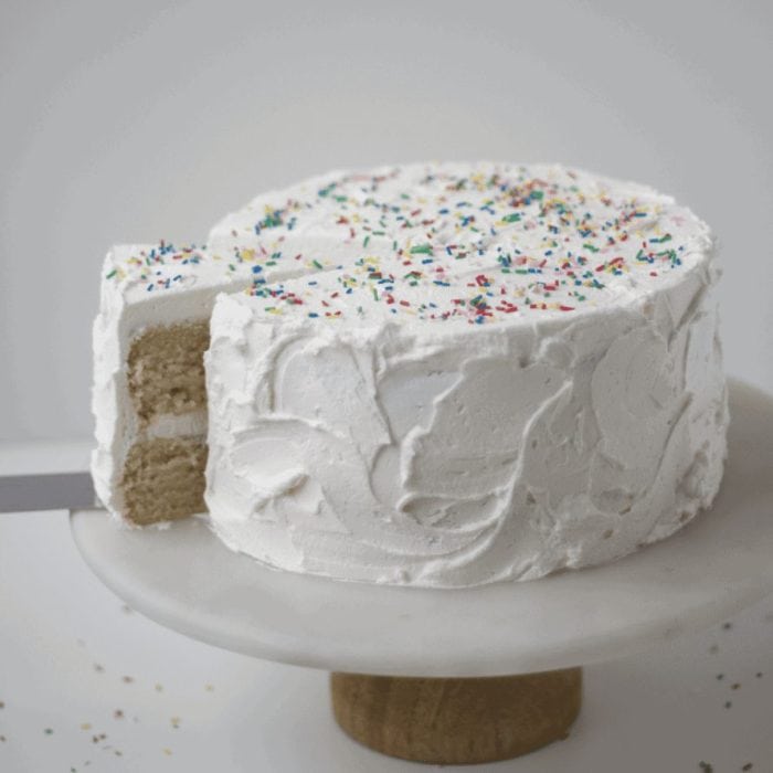 Relish the simplicity of this easy vegan vanilla cake, where the pure flavor of vanilla shines through a fluffy, tender crumb.