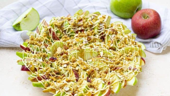 This dish has crisp apple slices drizzled with warm, gooey caramel sauce and buttery white chocolate sauce. 