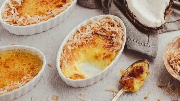 It features a creamy custard infused with the essence of coconut and finished with toasted coconut flakes, along with a perfectly torched sugar crust.