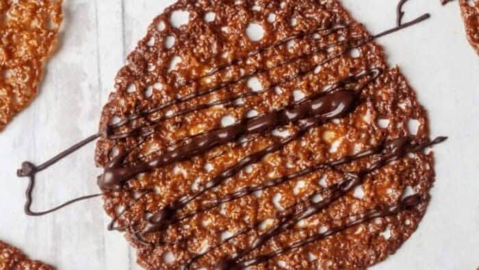 delicate elegance of these extraordinary almond flour lace cookies, which are thin, crispy confections that are as wonderful to look at as they are to eat