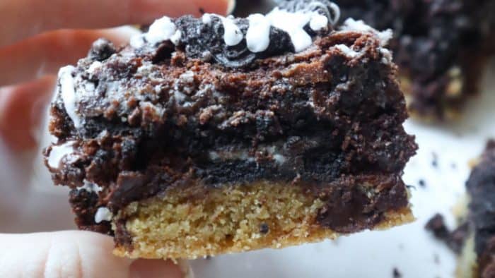 The chewy chocolate chip cookie serves as the foundation, while the brownies create a smooth, fudgy center.