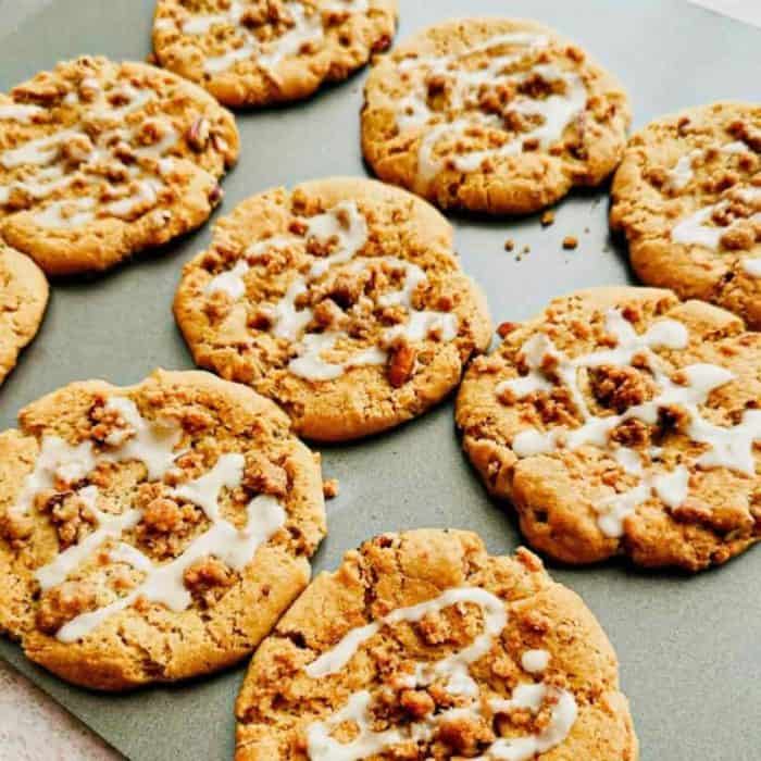 Topped with crumbly streusel and indulgent vanilla icing, these cookies are a morning treat that pairs splendidly with your favorite coffee.