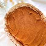 a close up photo of espresso tiramisu in a tub