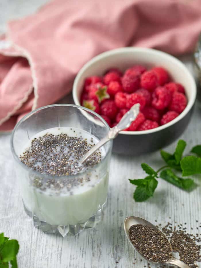 a cup of chosen plant-based milk with two tablespoons of chia seeds
