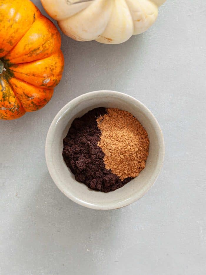 freshly ground coffee with 1 tablespoon of the homemade spice in a small mixing bowl