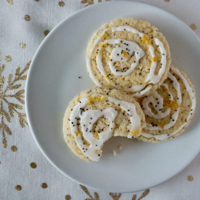 Lemon zest and poppy seeds come together in these cookies, offering a zesty, nutty, and crunchy bite finished with a sweet and thick lemony glaze. 