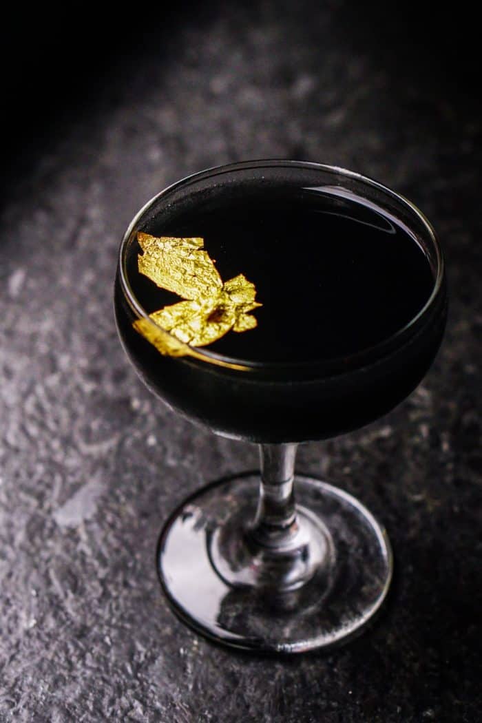 Mysterious Dark Black Mystery Cocktail with Gold Flake
