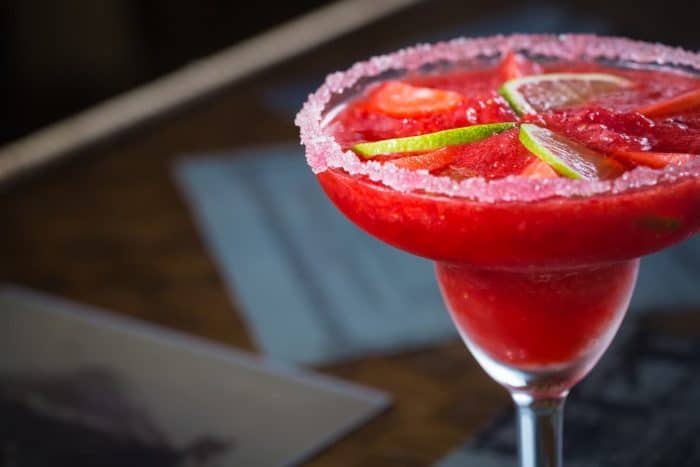 Strawberry margarita cocktail on the bar.