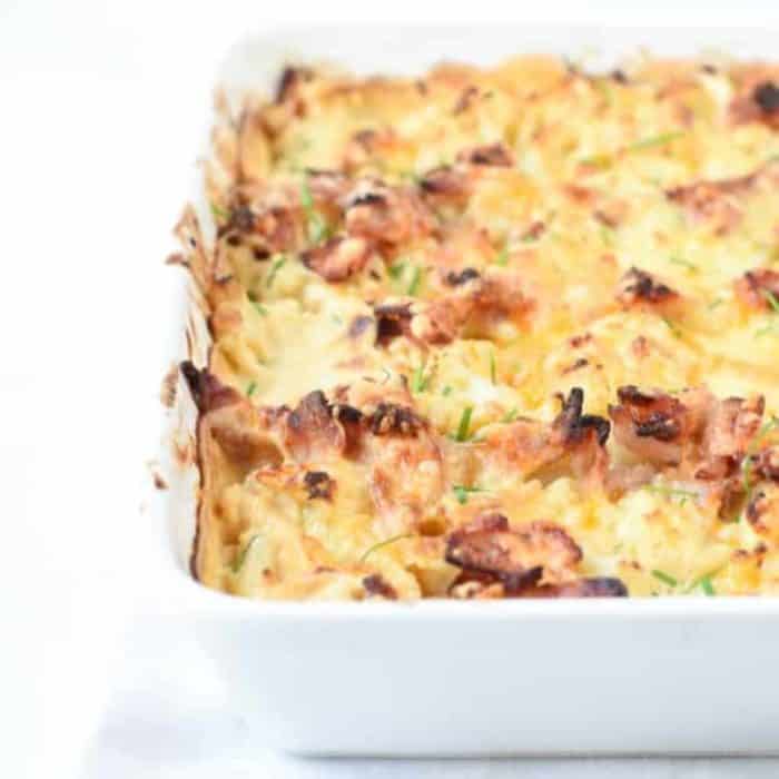a photo of cauliflower casserole on a white pan