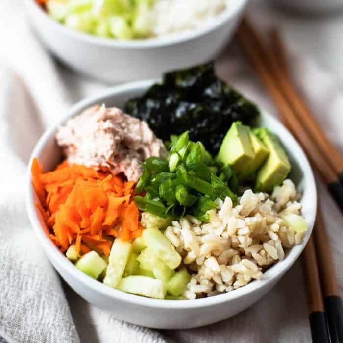 a white bowl full of tuna sushi recipe