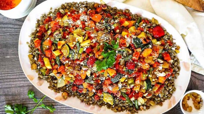 an oval plate full of moroccan roasted vegetable salad