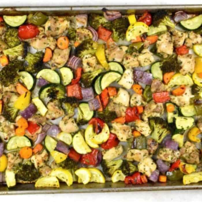 a sheet pan full of chicken and veggies