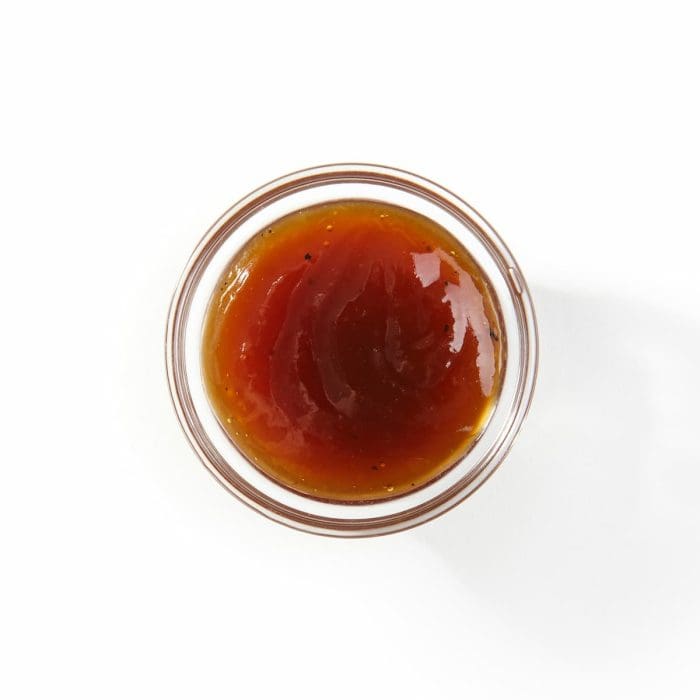 In a separate bowl, whisk together the sriracha, honey, soy sauce, and finely minced garlic to create the glaze.