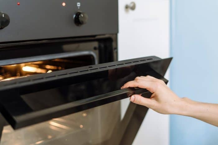 Place the glazed steaks onto the prepped baking sheet and put them in the oven to roast.