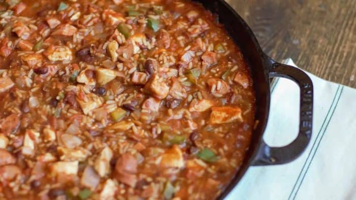a photo of smoked sausage and chicken jambalaya in a pan