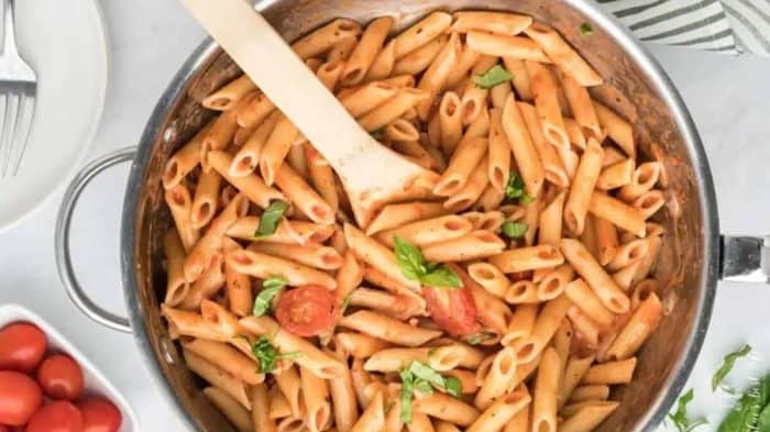Creamy Tomato Pasta Sauce With Coconut Milk in a casserole on top of a table