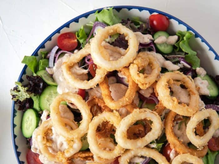 a close up image of crispy Calamari Salad